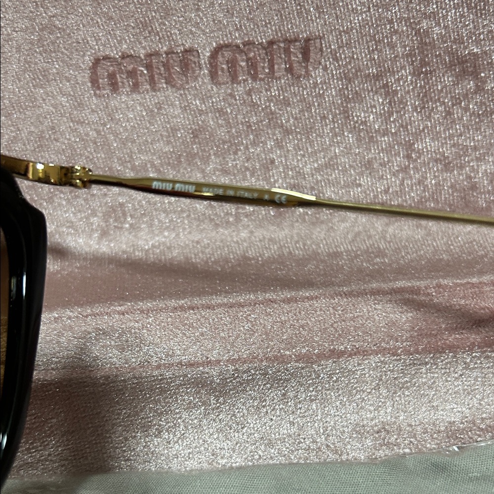 Miu Miu Black Frame Sunglasses with Brown Gradient Lenses - Picture 4 of 5